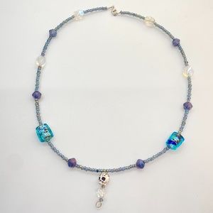 Silver Skull Pendant on Blue Shades Glass Beaded Necklace